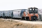 Rockdale Sandown & Southern MP15DC #15 pulls a cut of ROCK covered hoppers